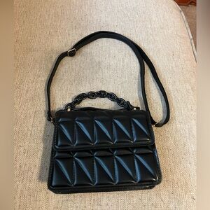 Black leather quilted purse with chain handle